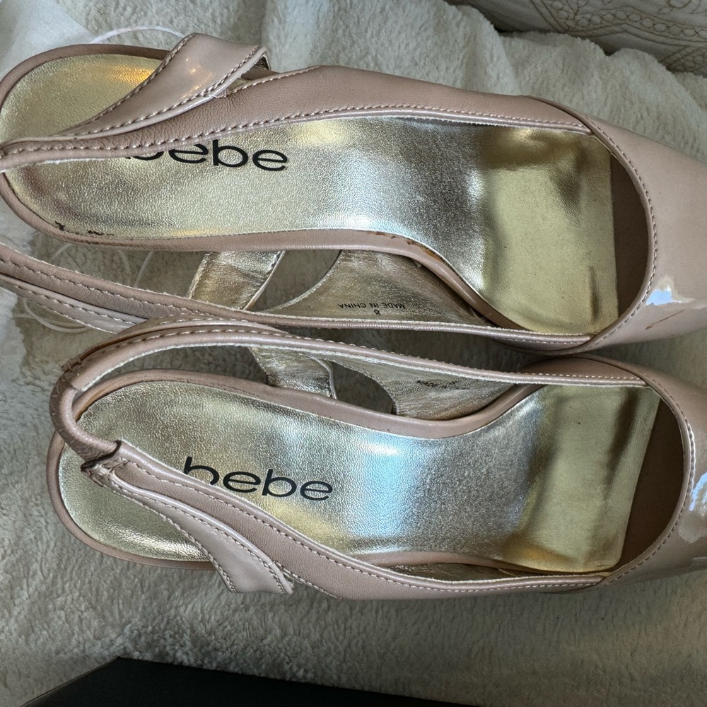 Beautiful Bebe high heel shoes.